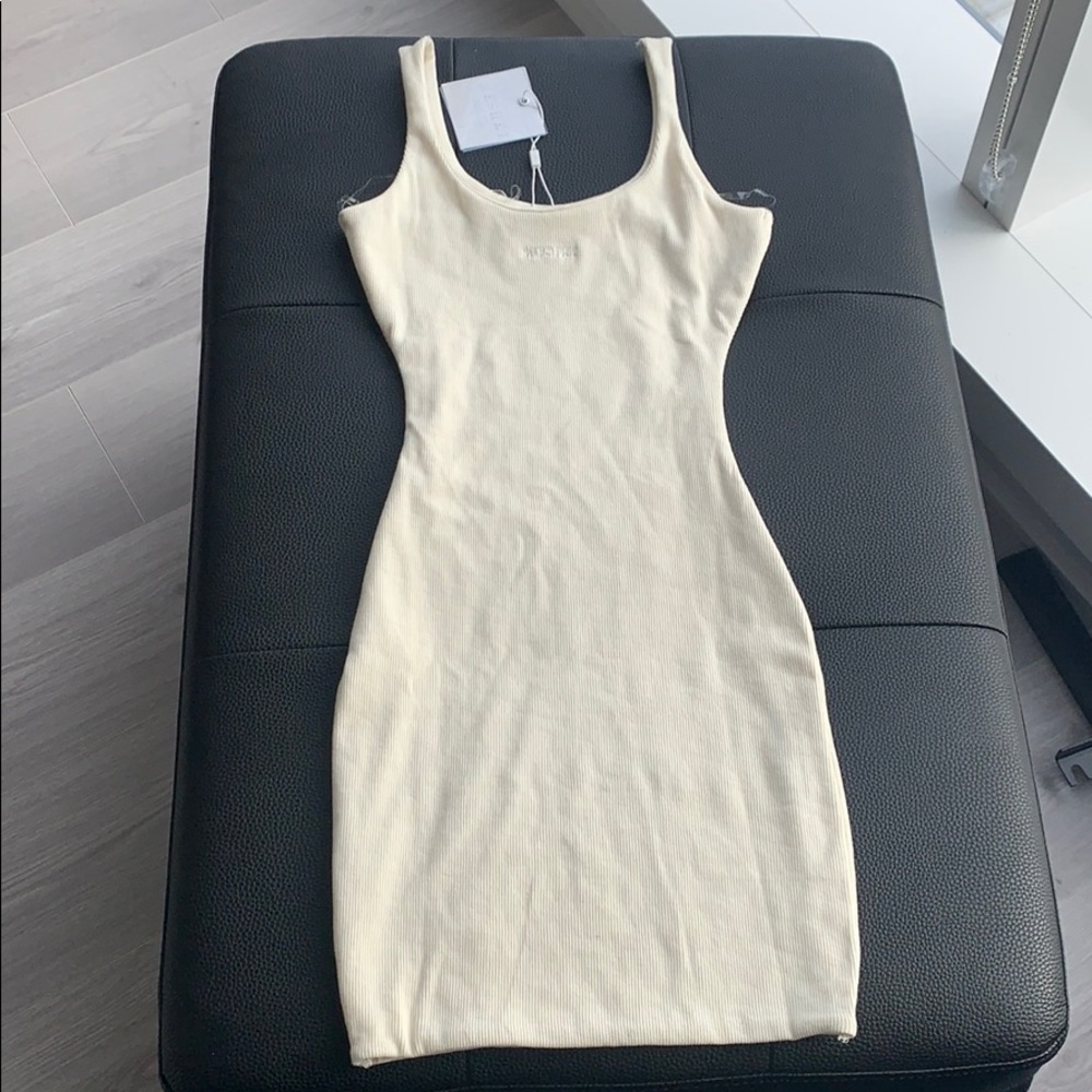 Brand new Meshki Basics body con - cream